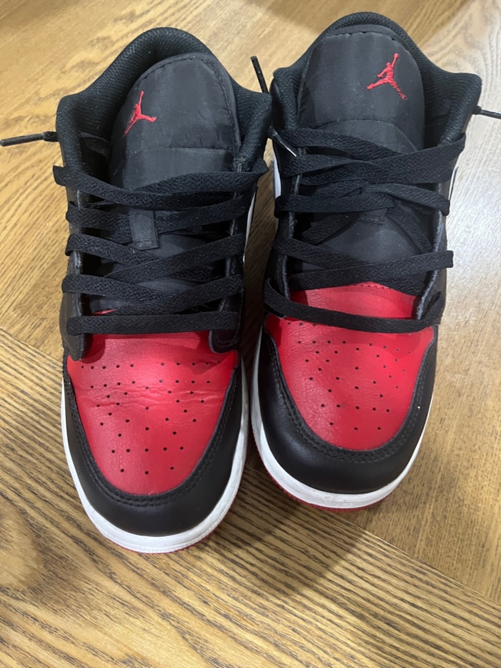 Jordan Black and Red Low-Top Sneakers with Jumpman Detail